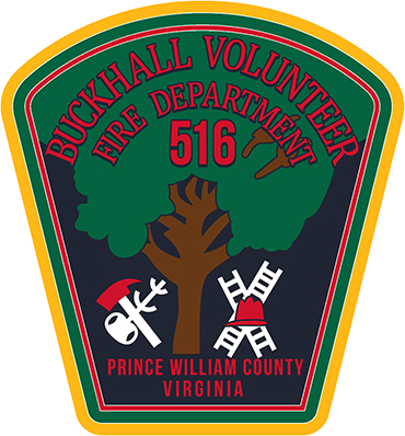 Buckhall Volunteer Fire Department patch with a tree, firefighting tools, ladder, helmet, and Prince William County, Virginia text, on a green and yellow bordered shield.