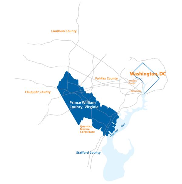 Map highlighting Prince William County, Virginia in blue, showing its location relative to nearby counties and Washington, DC, with major roads and the Quantico Marine Corps Base.